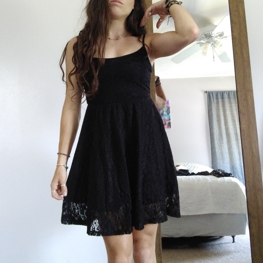 Black lace mini dress with adjustable straps